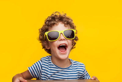 PSA: Sunglasses Are Just As Important As Sunscreen For Your Kids